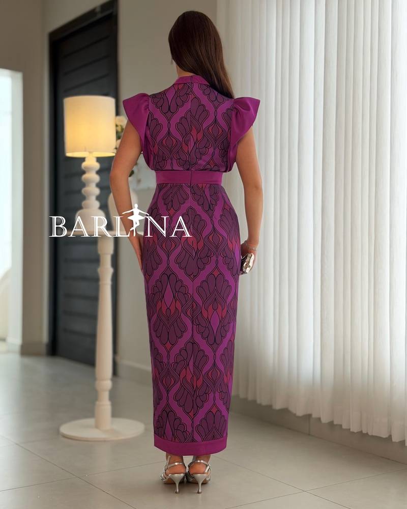 Purple dress with prominent ruffled sleeves