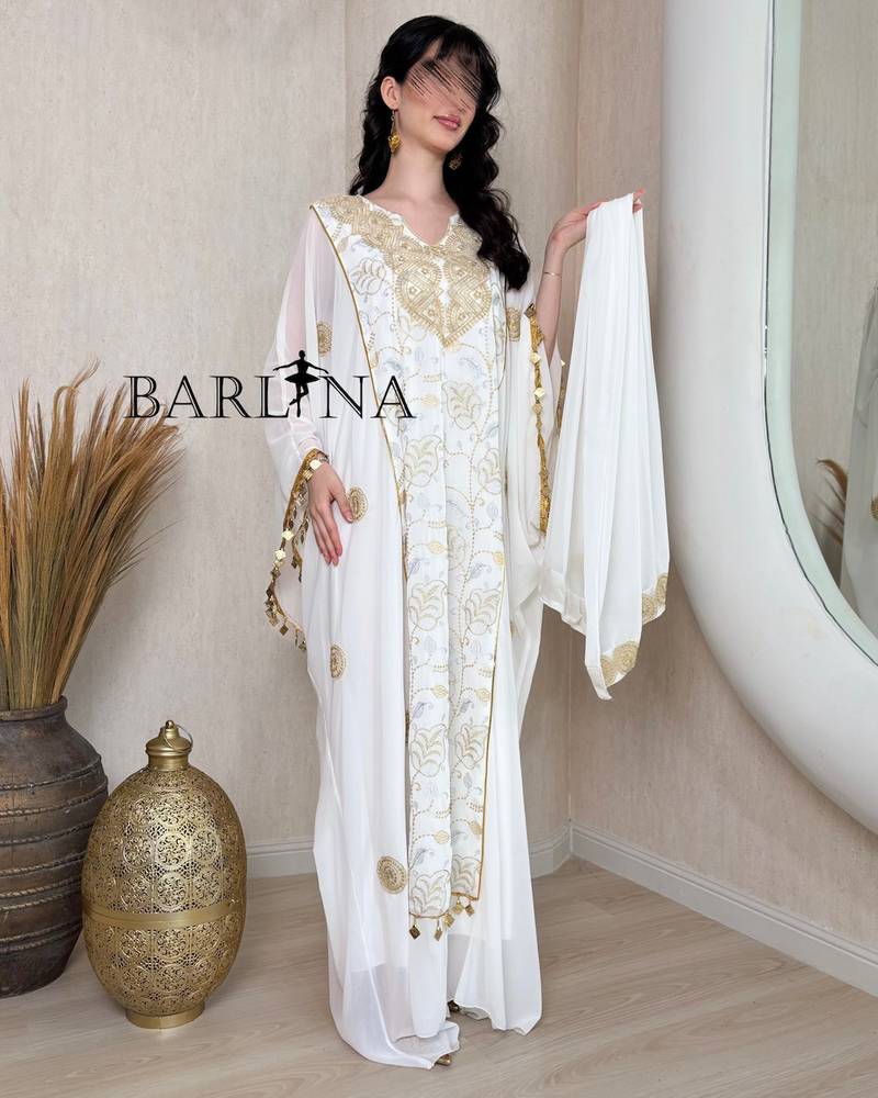 Luxurious jalabiya with gold embroidery and a shawl