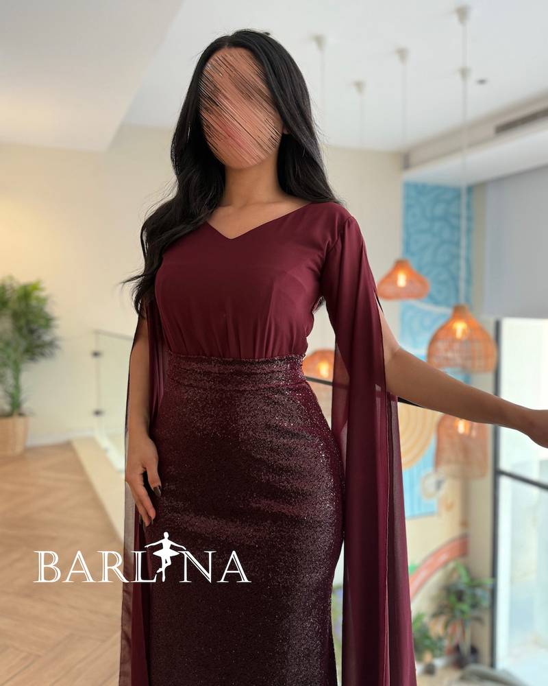 Burgundy dress with long flowing sleeves
