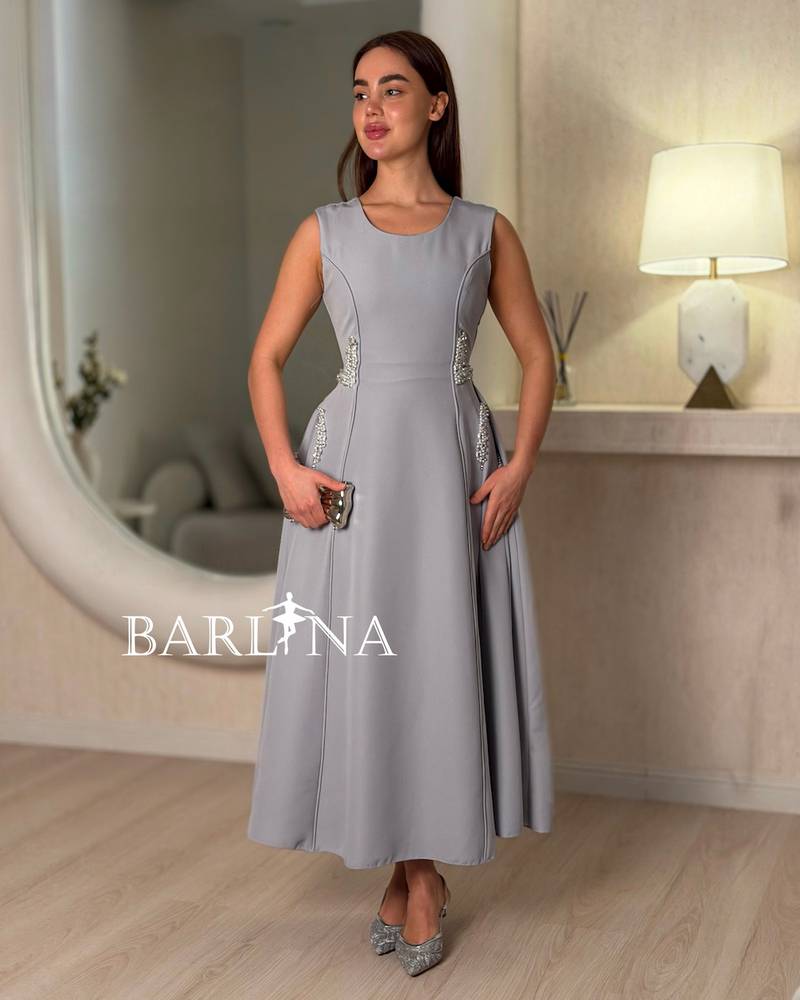 Soft gray dress with a fitted cut