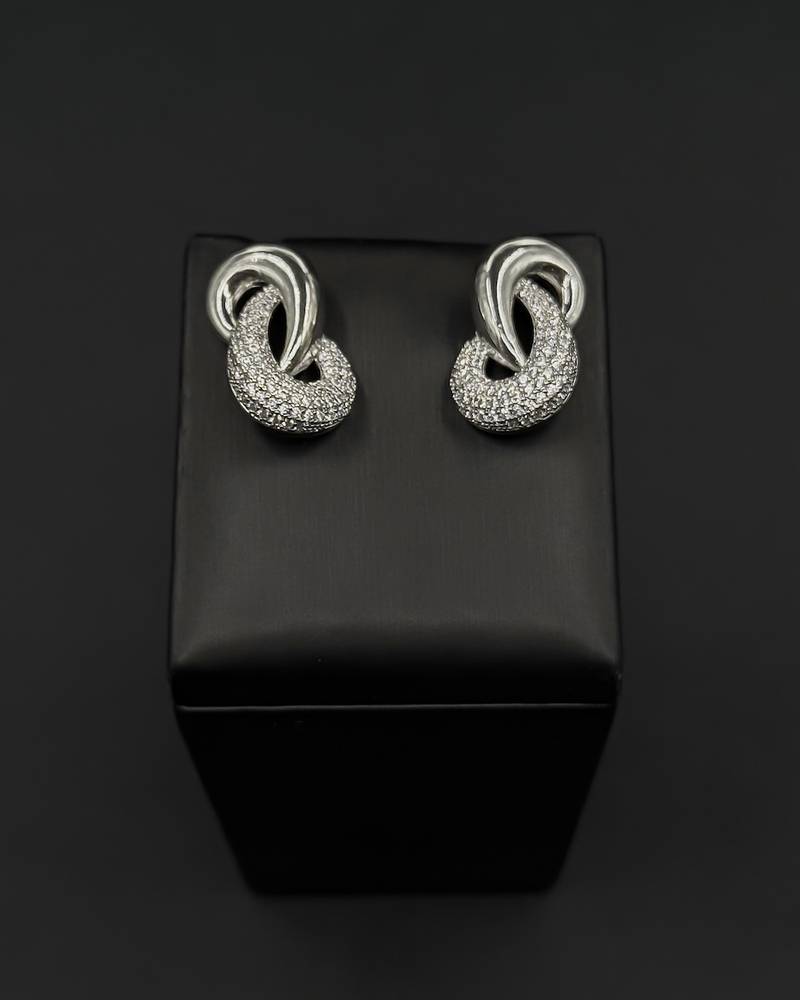 Luxurious earrings with interlocking studded hoops