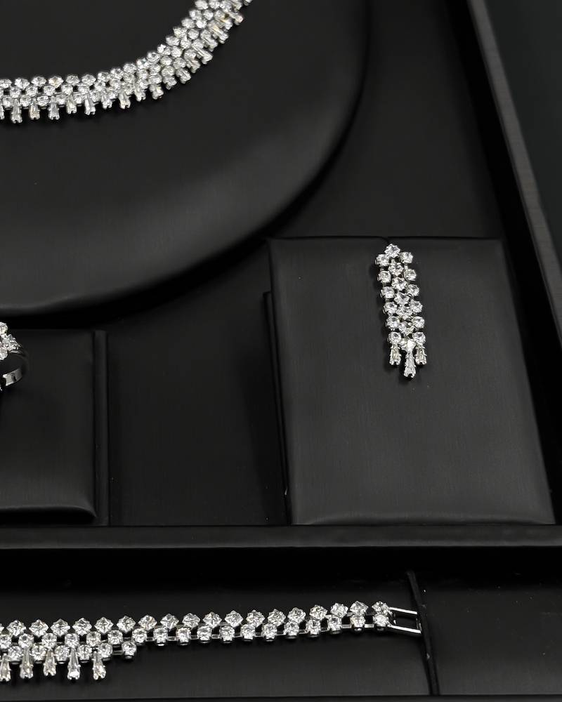 Round design accessory set studded with sparkling stones