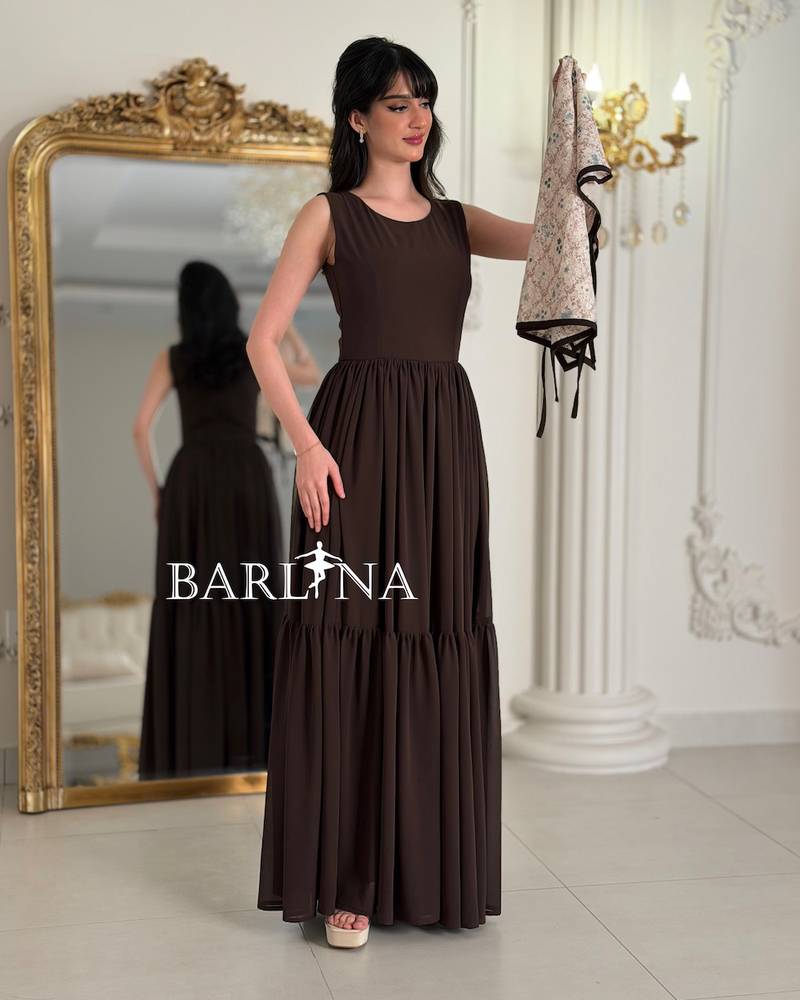 Brown jalabiya with a delicate patterned overlay