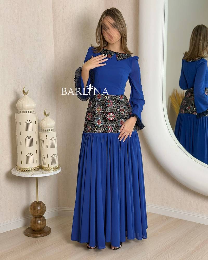 Blue jalabiya with a soft cut and traditional embroidery