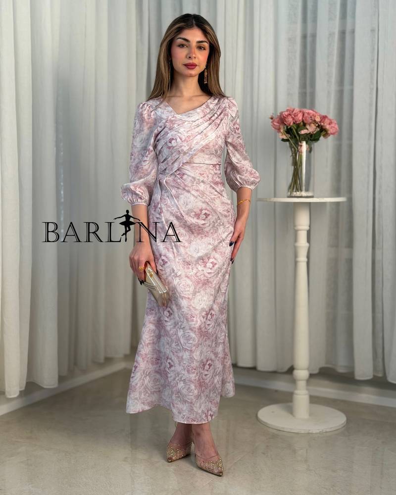 A pink dress with delicate floral patterns