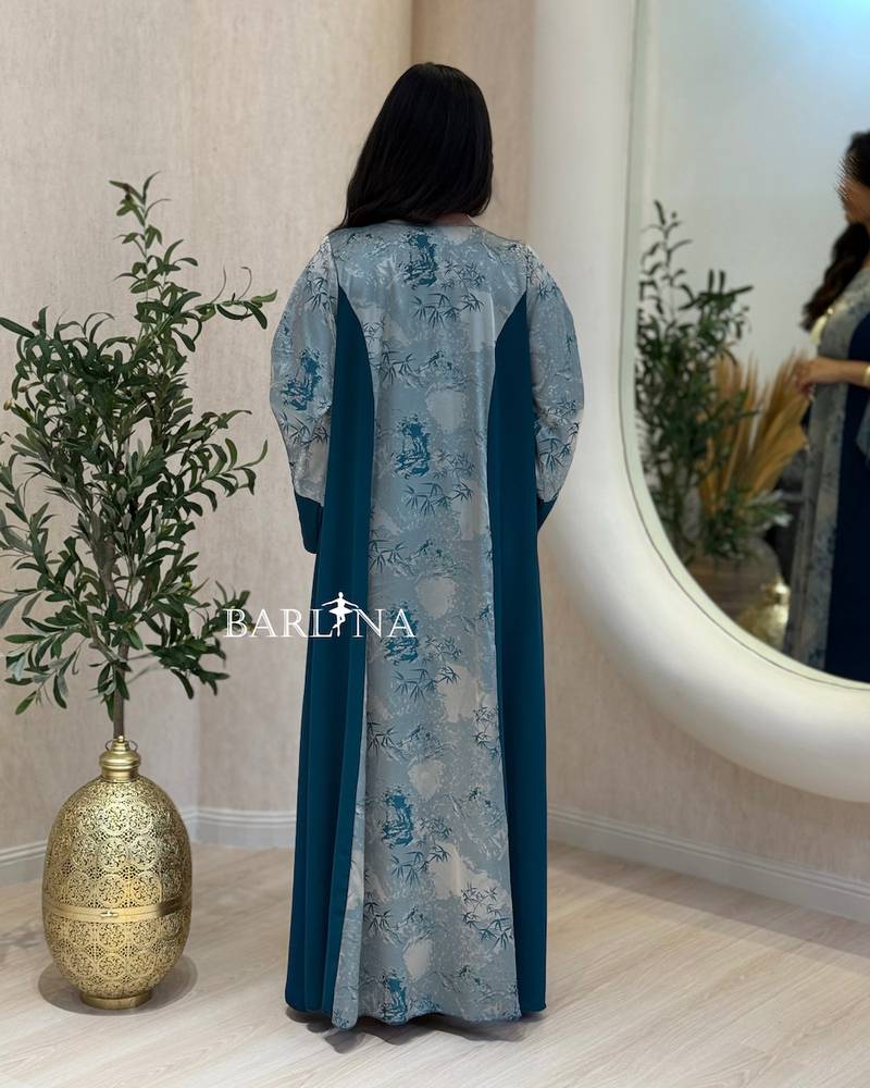 Blue jalabiya with a floral front detail