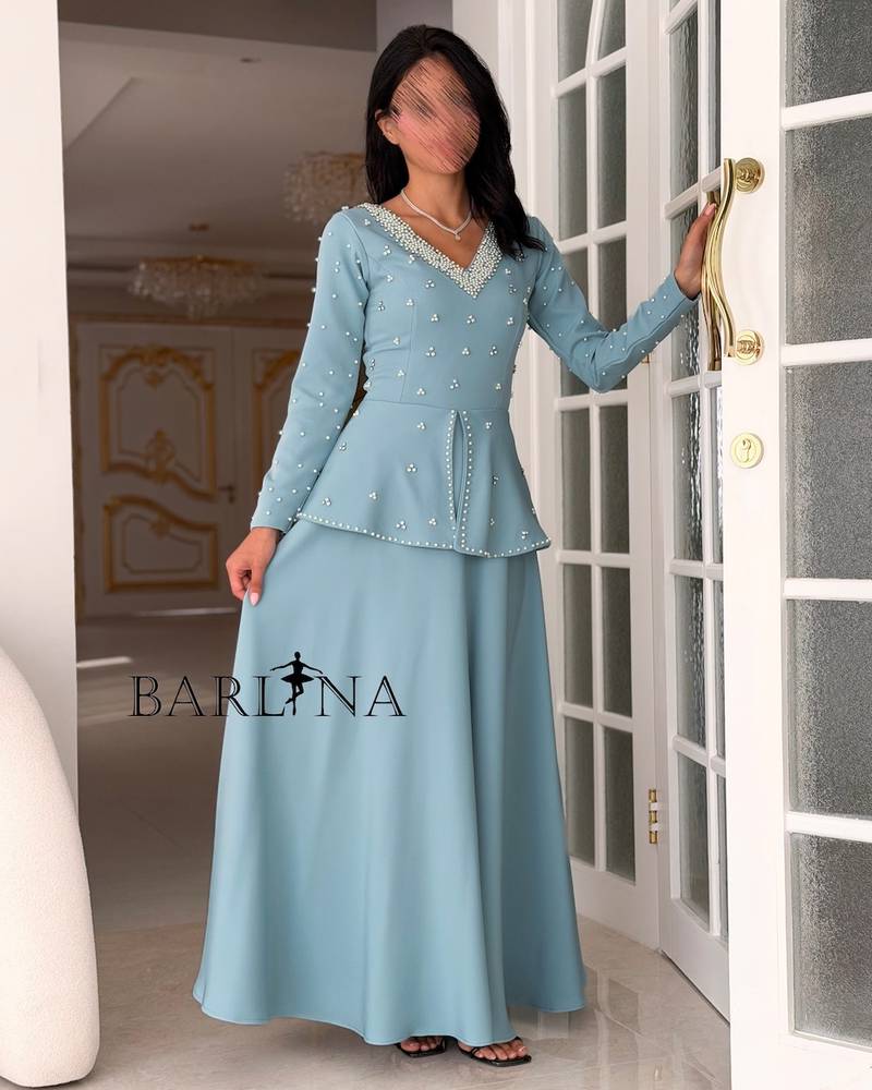 Sky blue V-neck dress embroidered with pearls and crystals