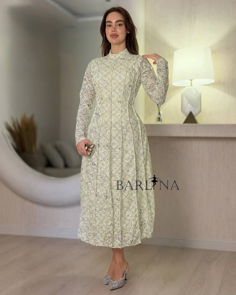 Off-white dress with apple-colored floral print