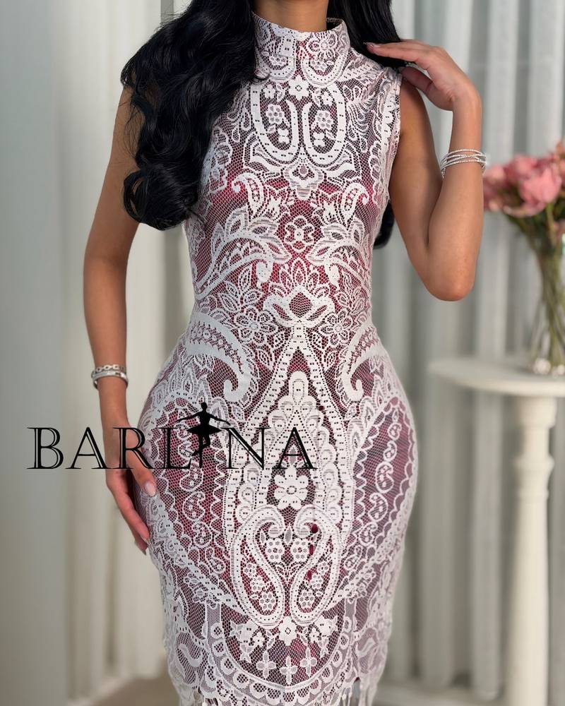 White dress with lined fabric and draped hem
