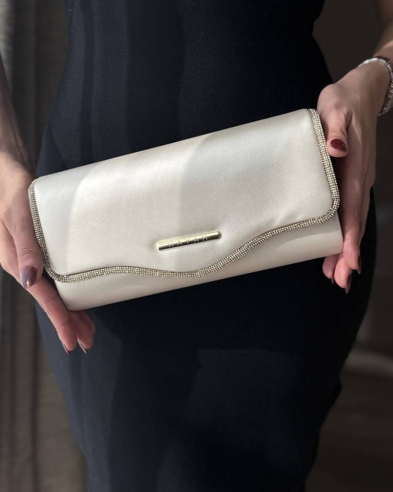 Clutch bag decorated with crystal trim