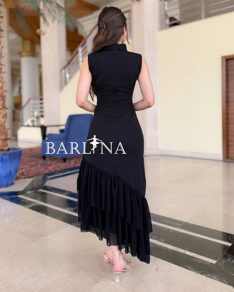 Elegant black dress with delicate purple embroidery