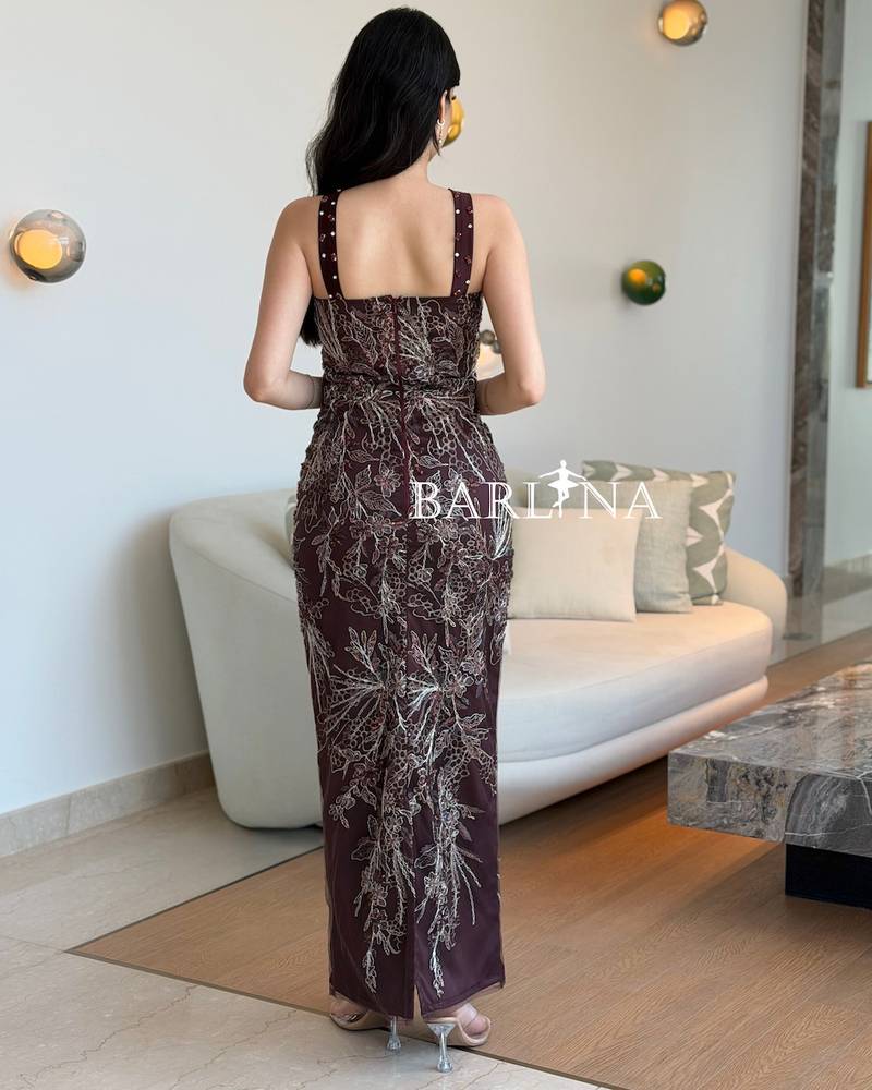 Lilac dress embroidered with silver lines and patterns