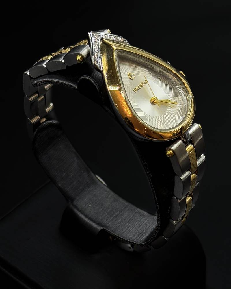 Women's watch with a teardrop-shaped bezel