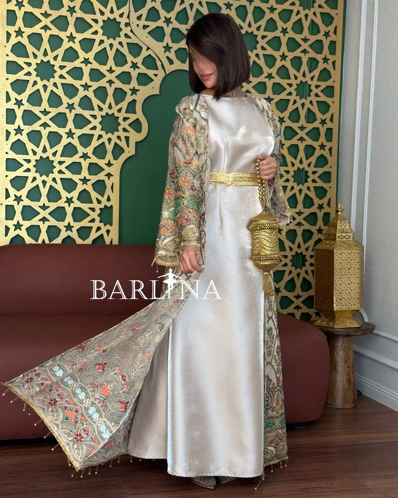 Off-white jalabiya with a decorative outer layer