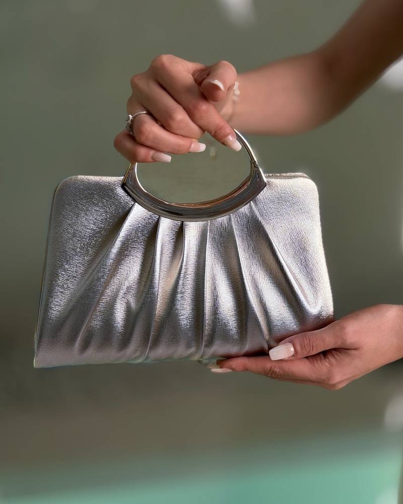 Evening bag with a soft design and elegant pleats