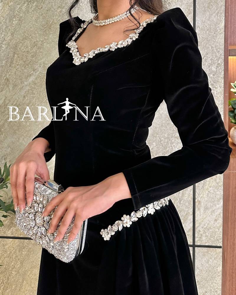 Black velvet dress with crystal embellishment