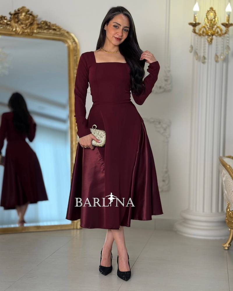 A burgundy midi dress with an elegant