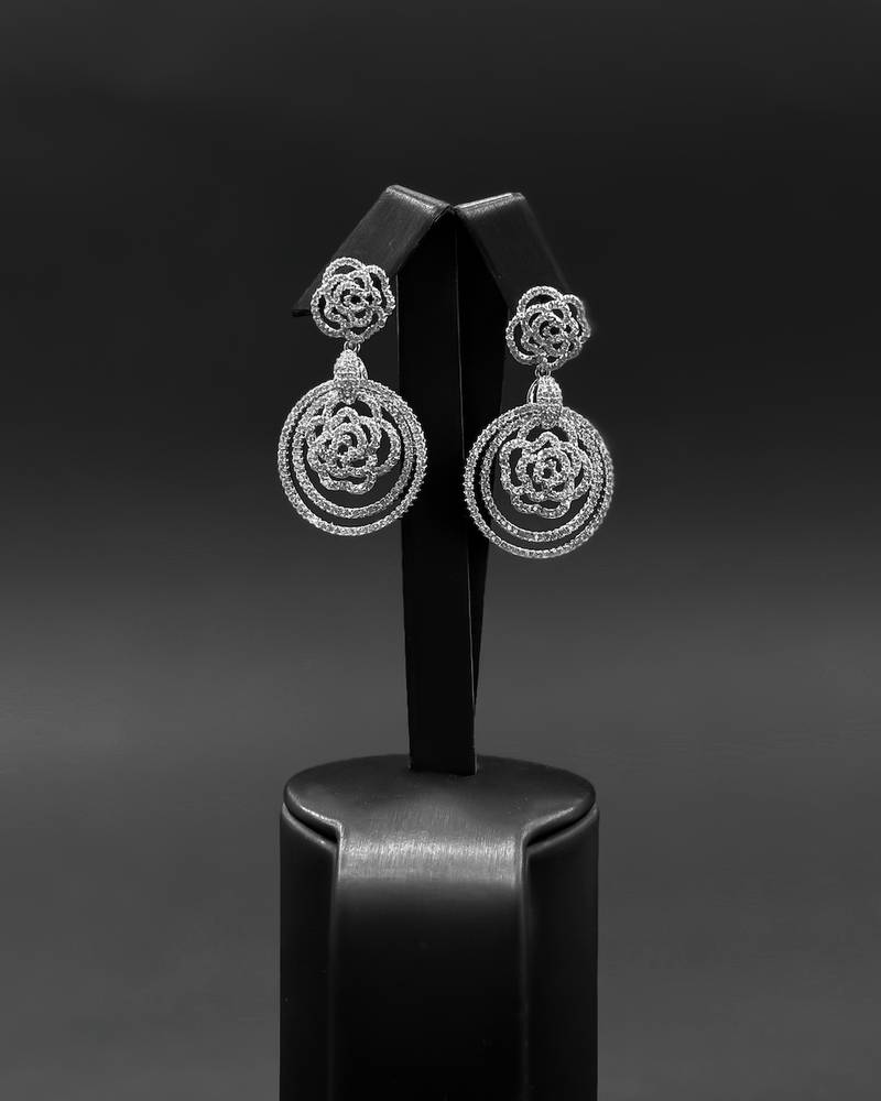 Hoop earrings with an interlocking rose design