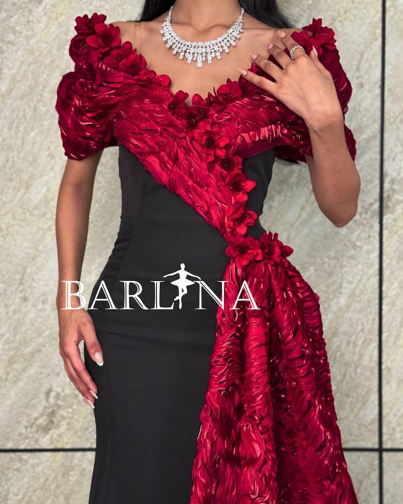 Black dress with red rose detailing