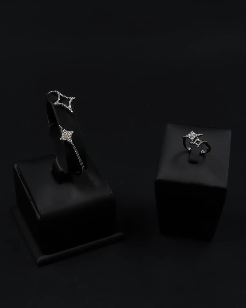 Bracelet and ring with a studded star design