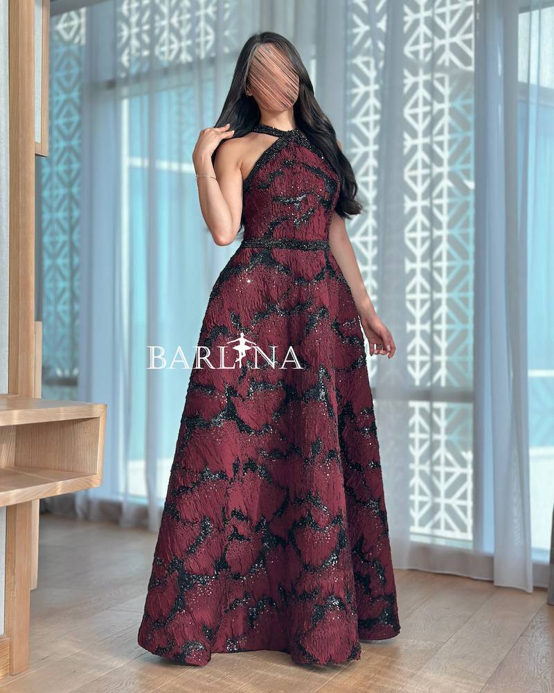 Elegant burgundy dress with black patterns