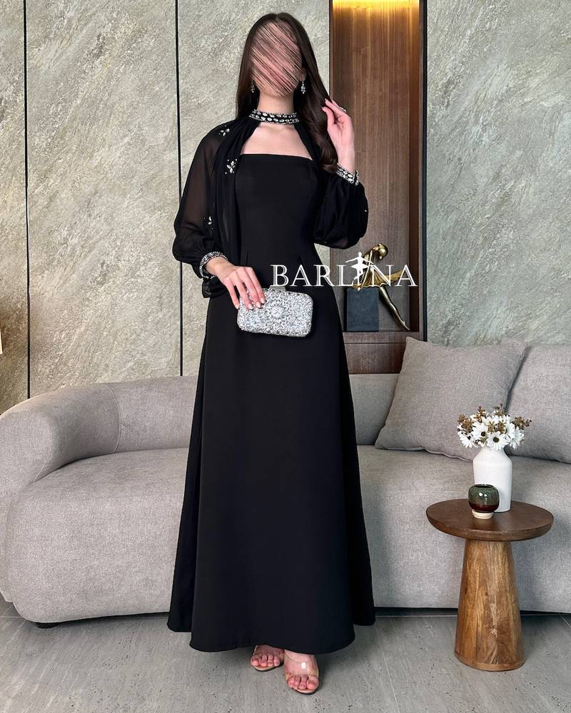 Luxury black dress with sheer sleeves