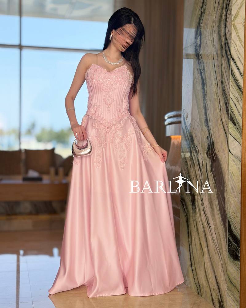 Pink evening set with embroidered corset design
