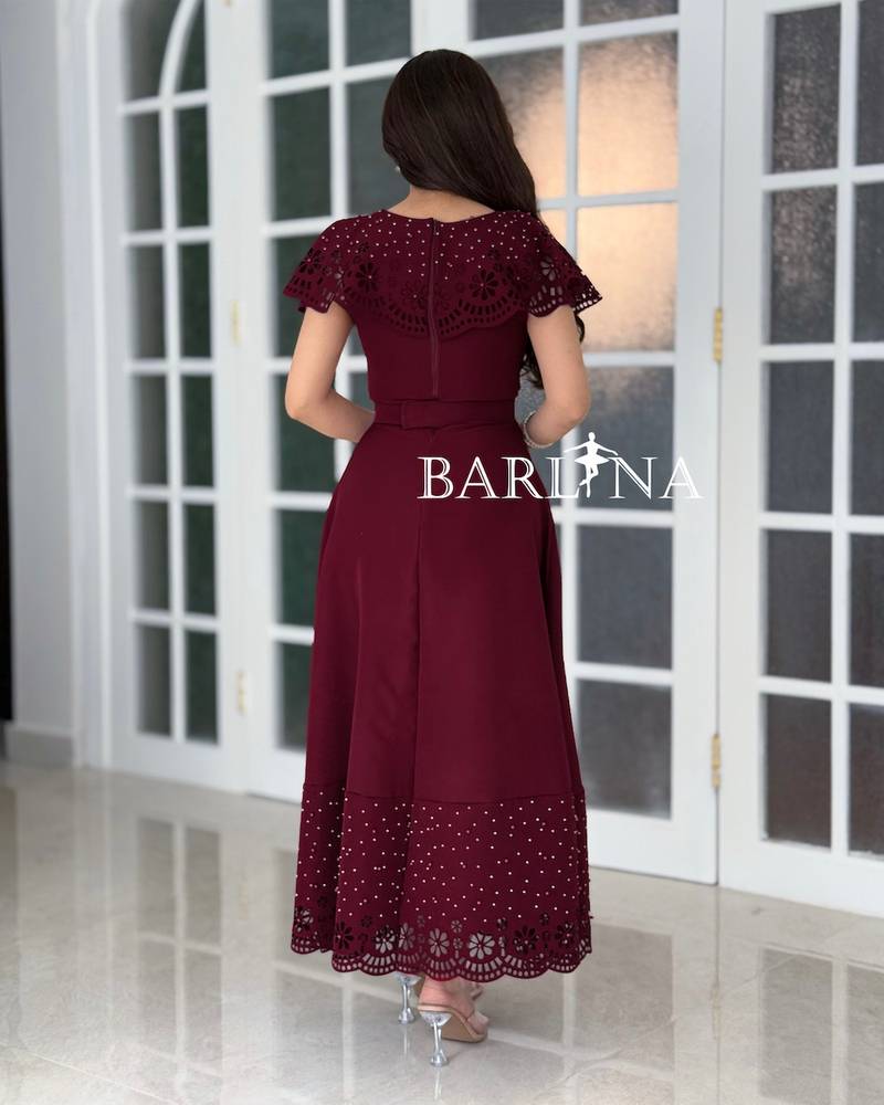 Burgundy dress with embroidery on the bodice and hem