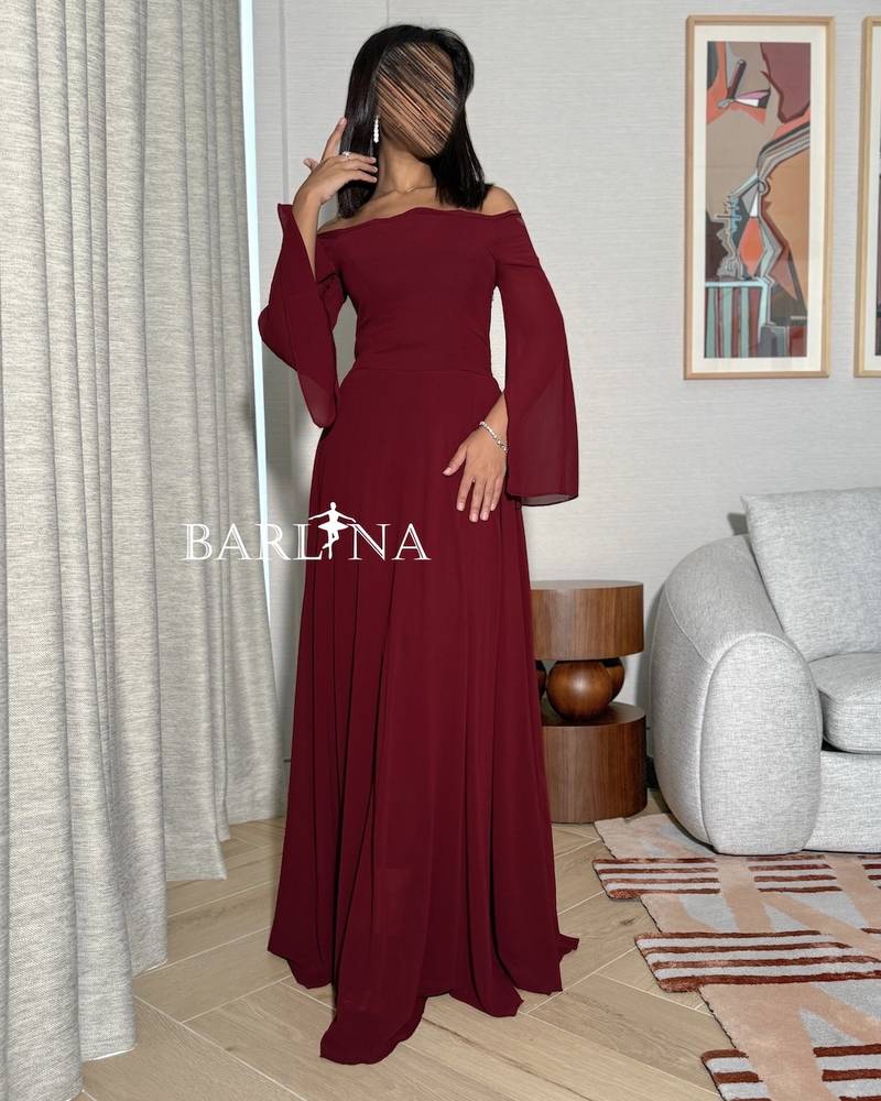 A simple burgundy dress in flowing chiffon fabric