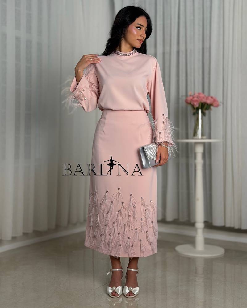 Soft pink midi set with elegant feather details