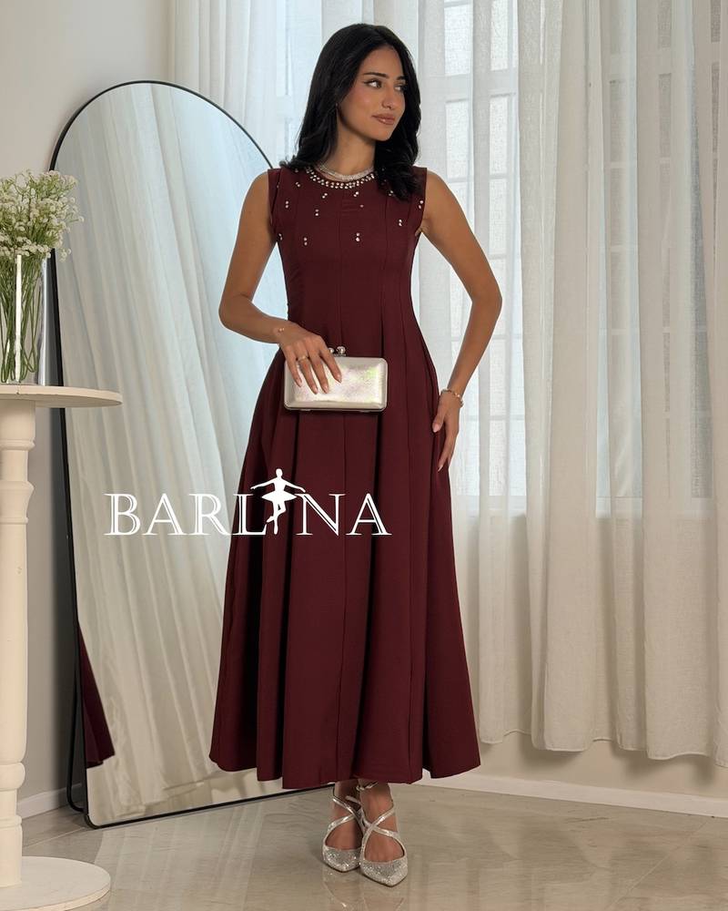 Elegant burgundy dress with a soft flared silhouette