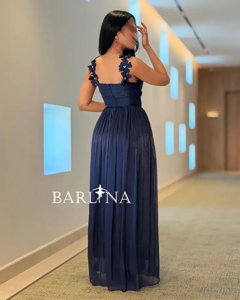 Long navy dress with embroidered details