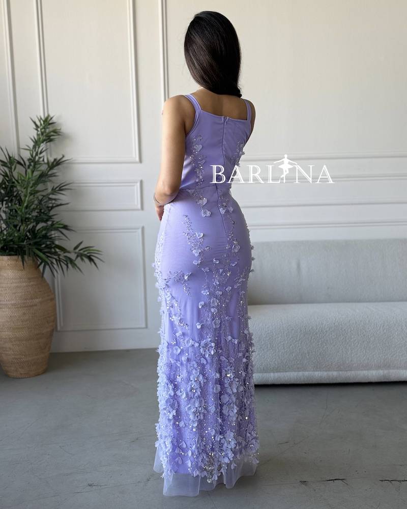 Long lavender-colored dress with floral embroidery