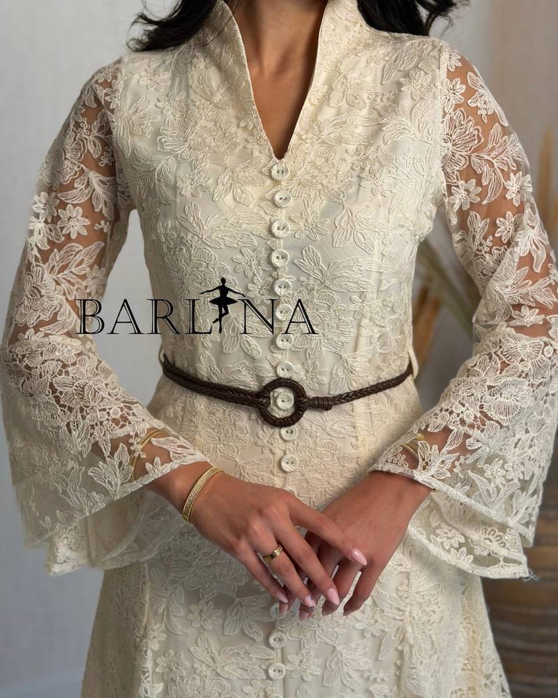 Elegant beige dress with delicate lace and belt
