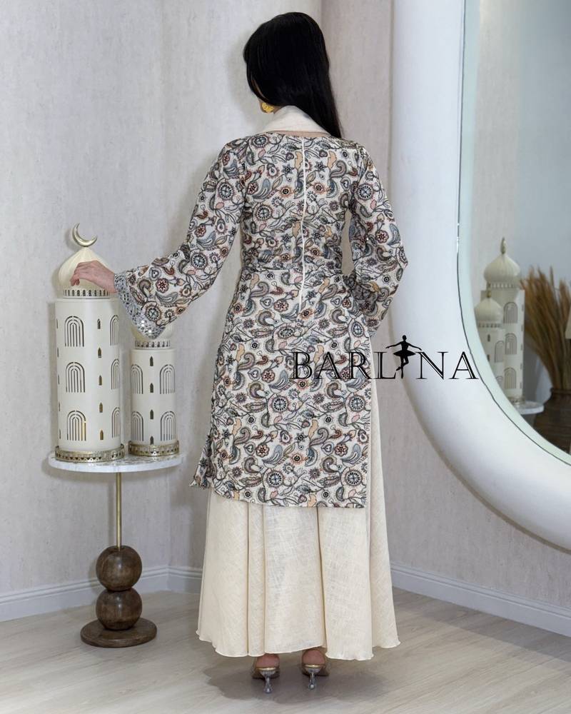 Soft, asymmetrical cut, sugar-colored jalabiya