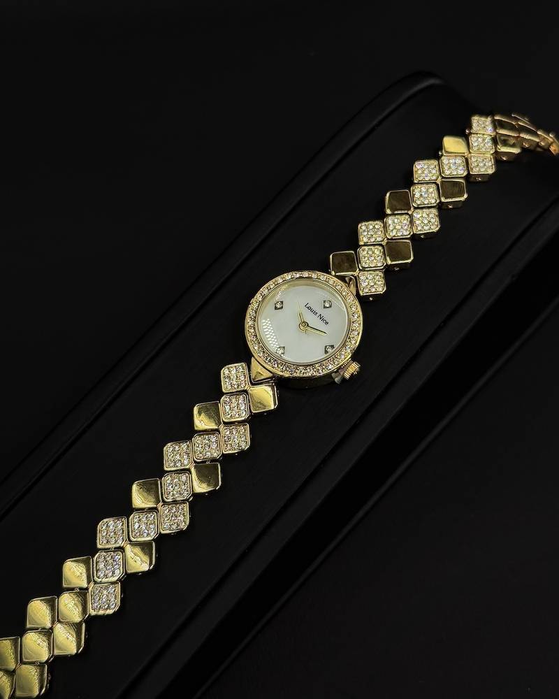 A women's watch with elegant, shimmering details.