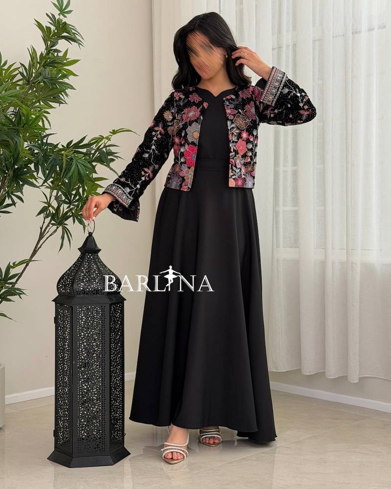 Black jalabiya with a short embroidered jacket