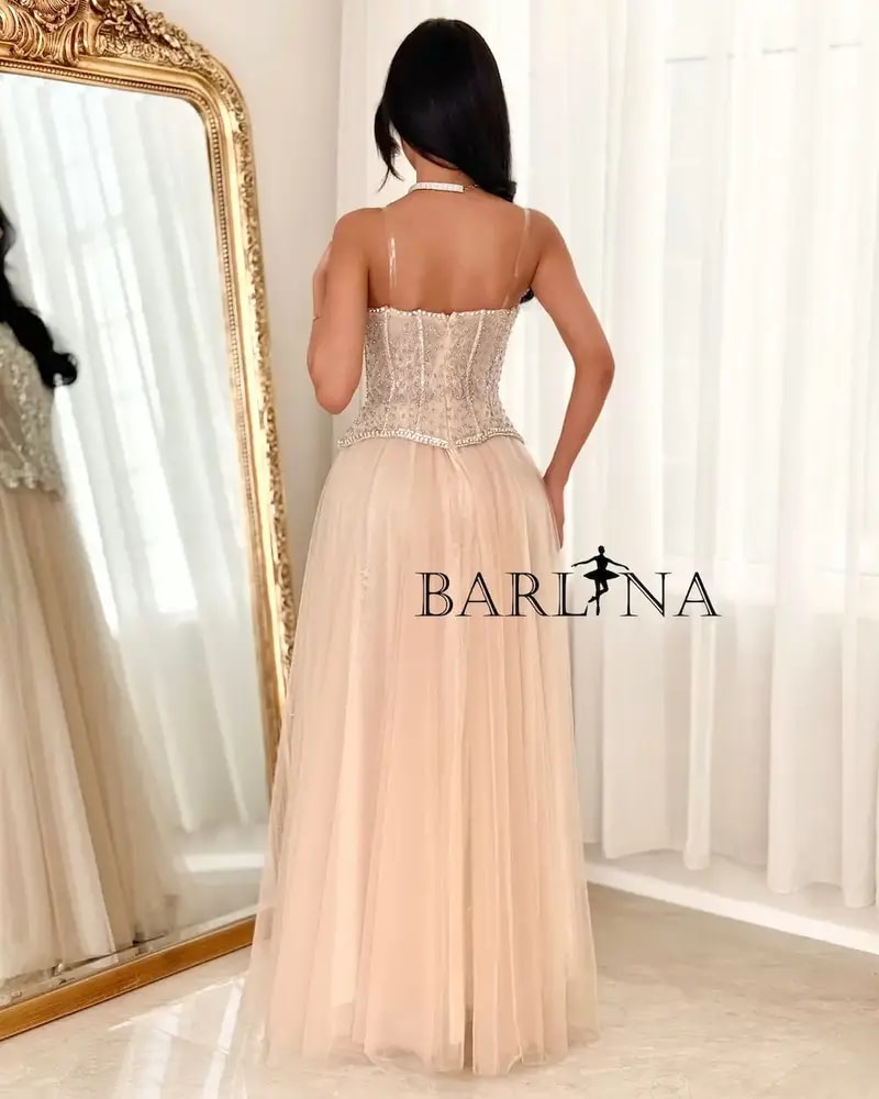 Beige evening dress with embroidered corset