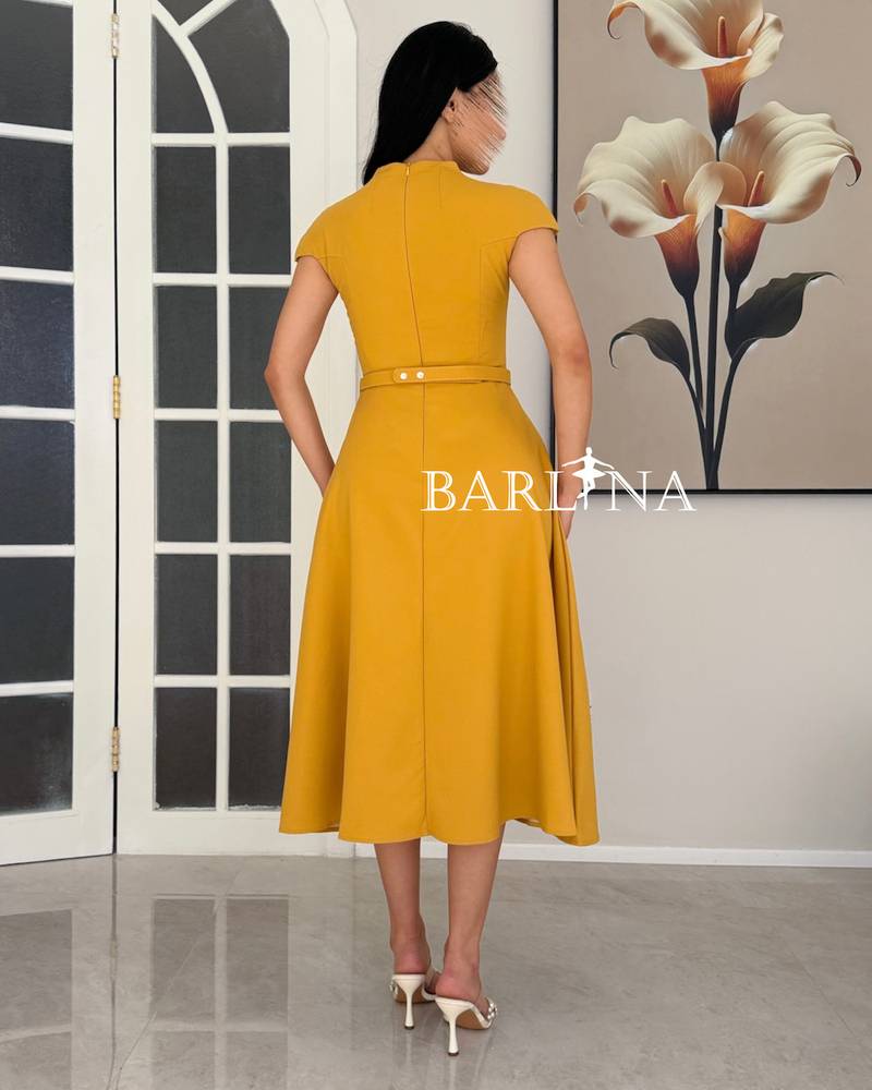 A soft dress adorned with delicate details