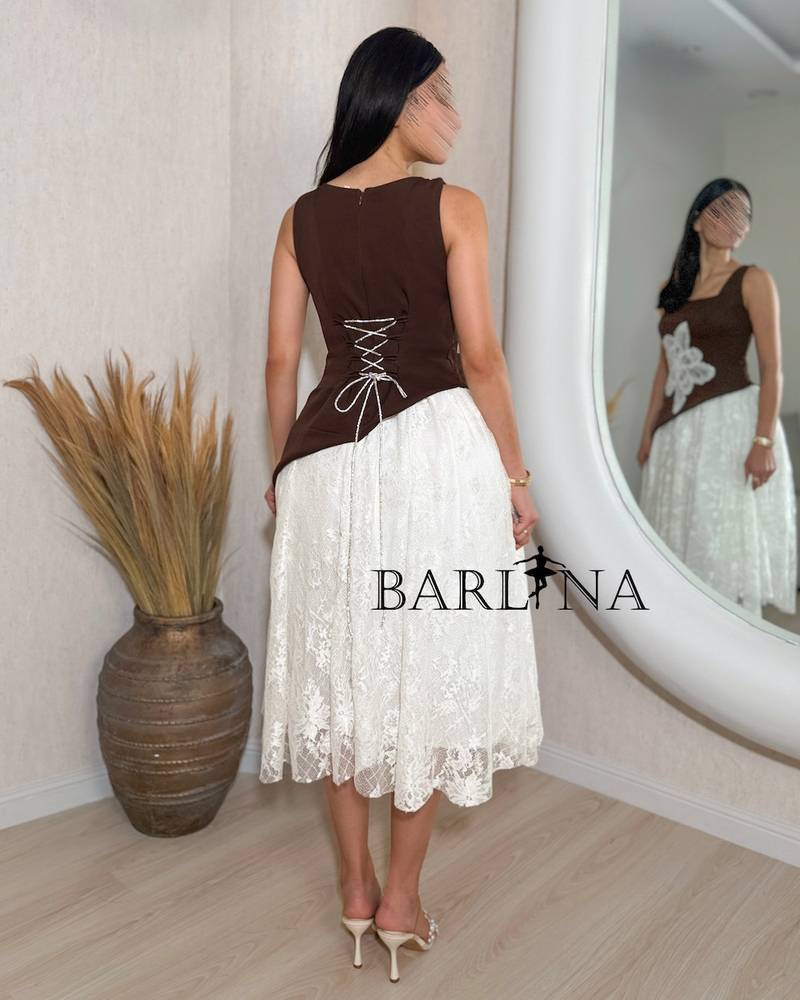 Soft brown and white embellished dress