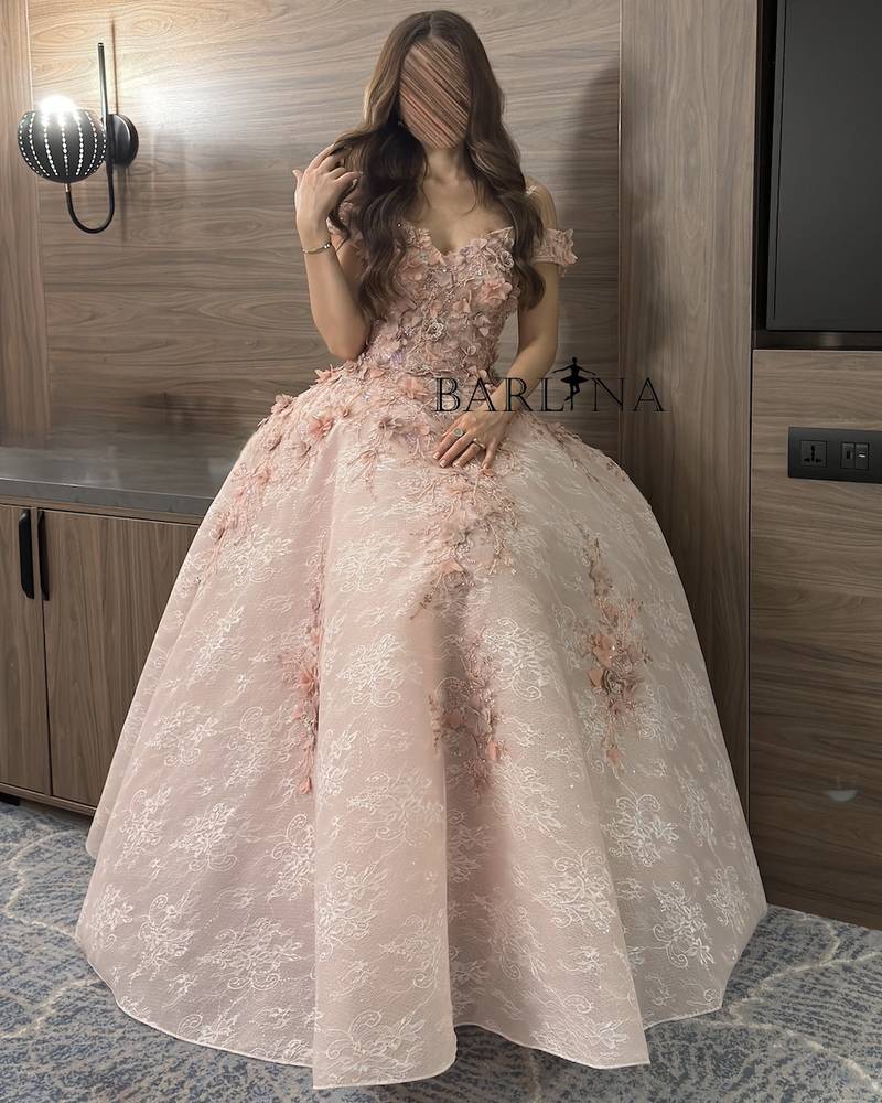 Pink lace evening dress with soft flowers