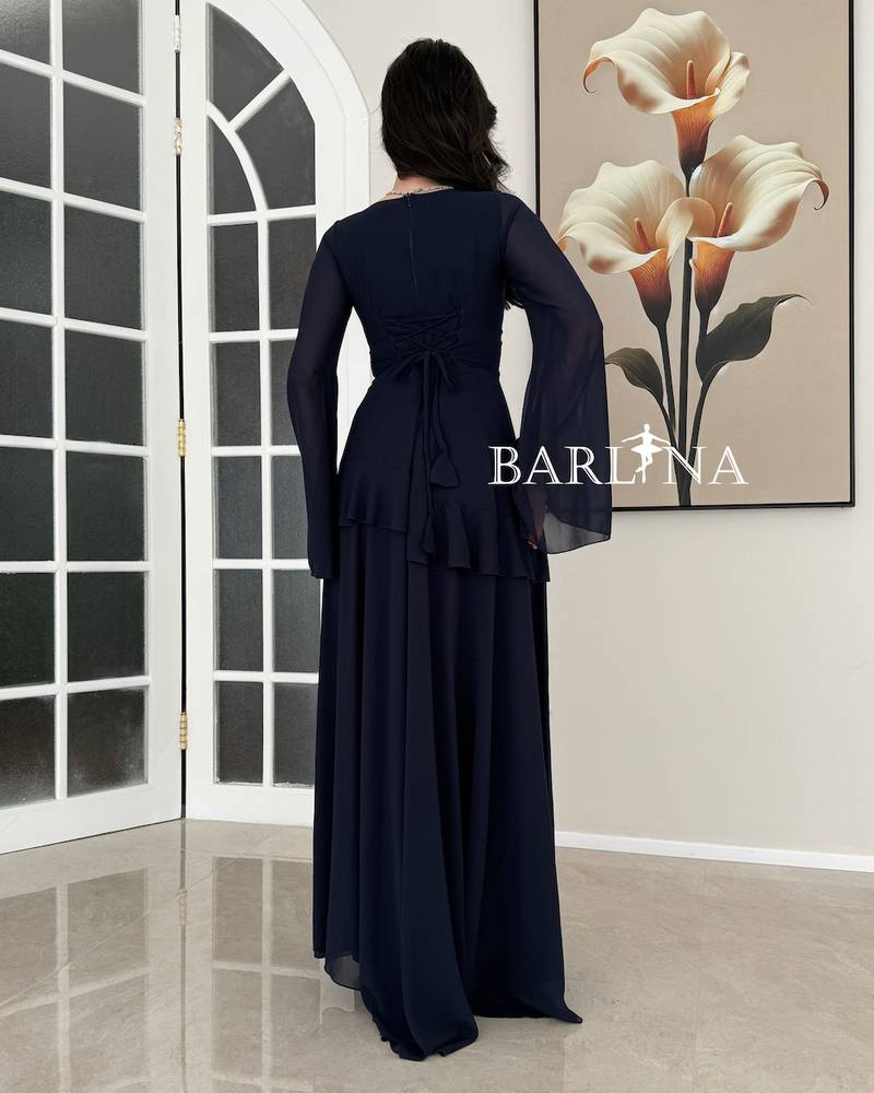 Elegant navy blue dress with a flowing silhouette and wide sleeves