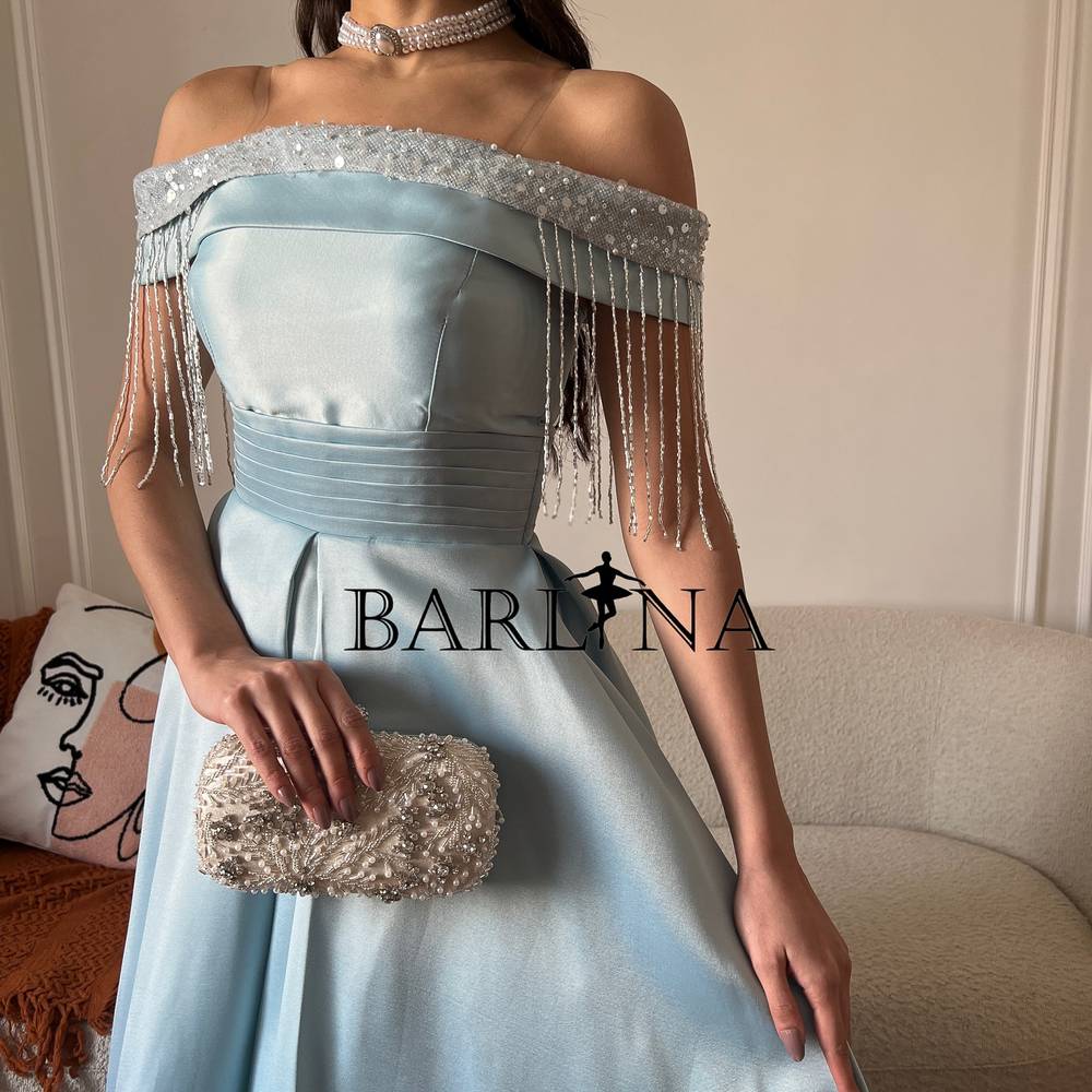 Blue dress decorated with beads