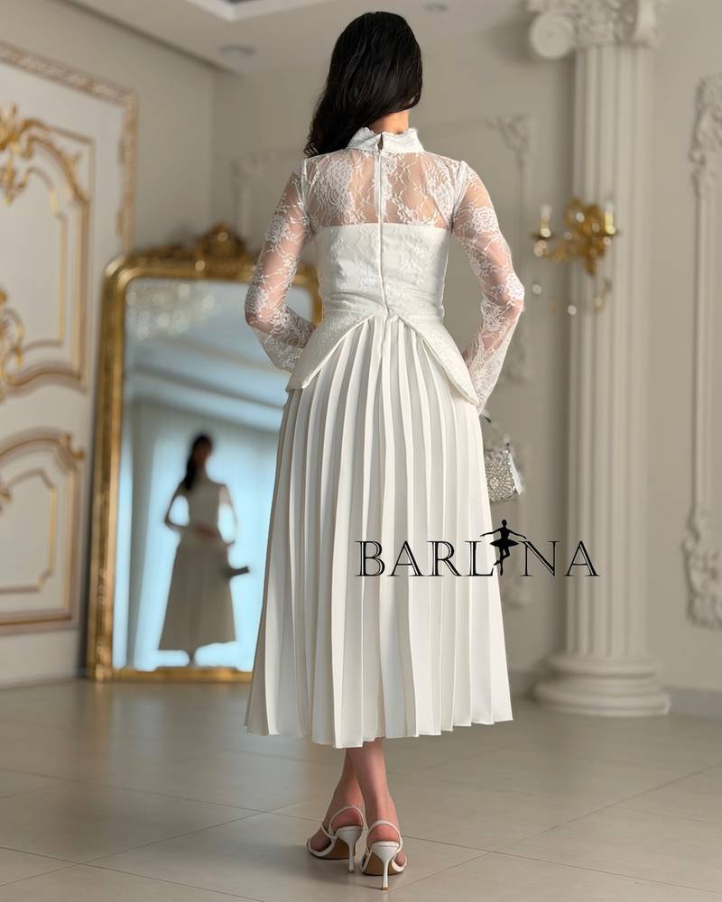 White dress with lace and soft pleats