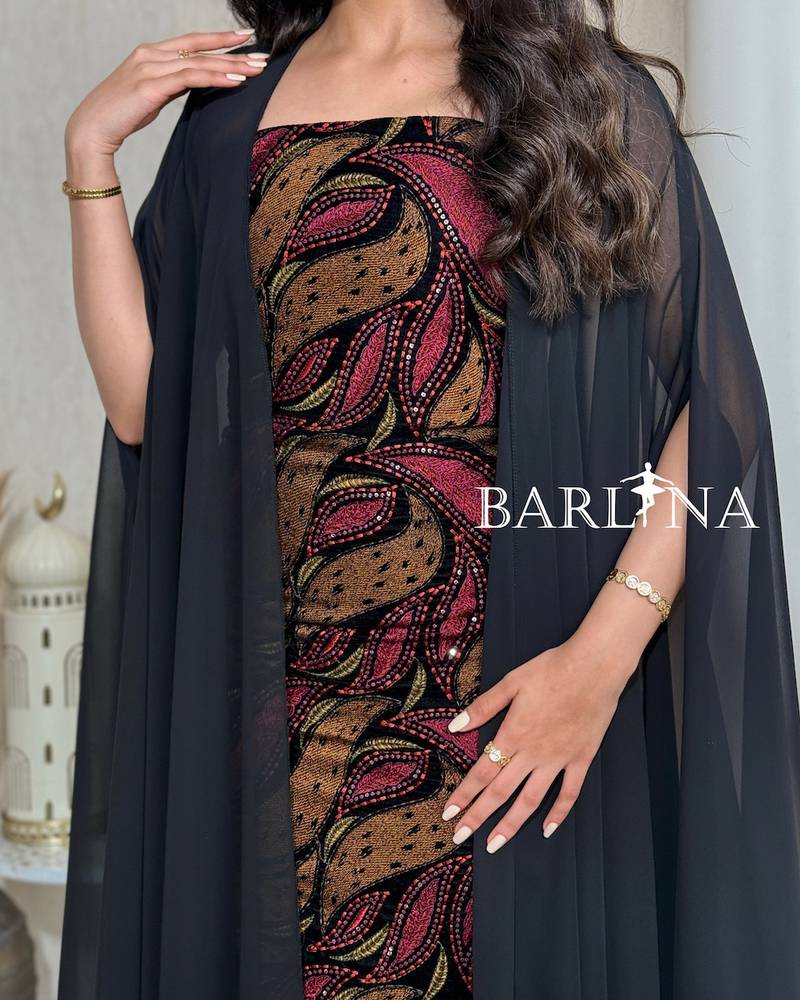 Jalabiya with artistic patterns in shades of brown and burgundy
