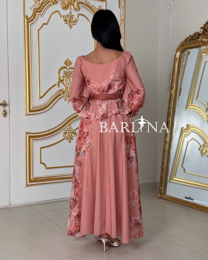 Floral pink set with a ruffled waist and flowing skirt