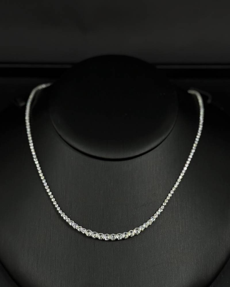 Accessory set studded with round stones