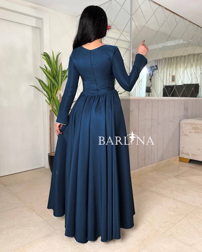 Long-sleeved petroleum-colored dress