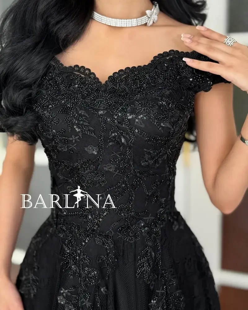 Black evening dress with lace fabric