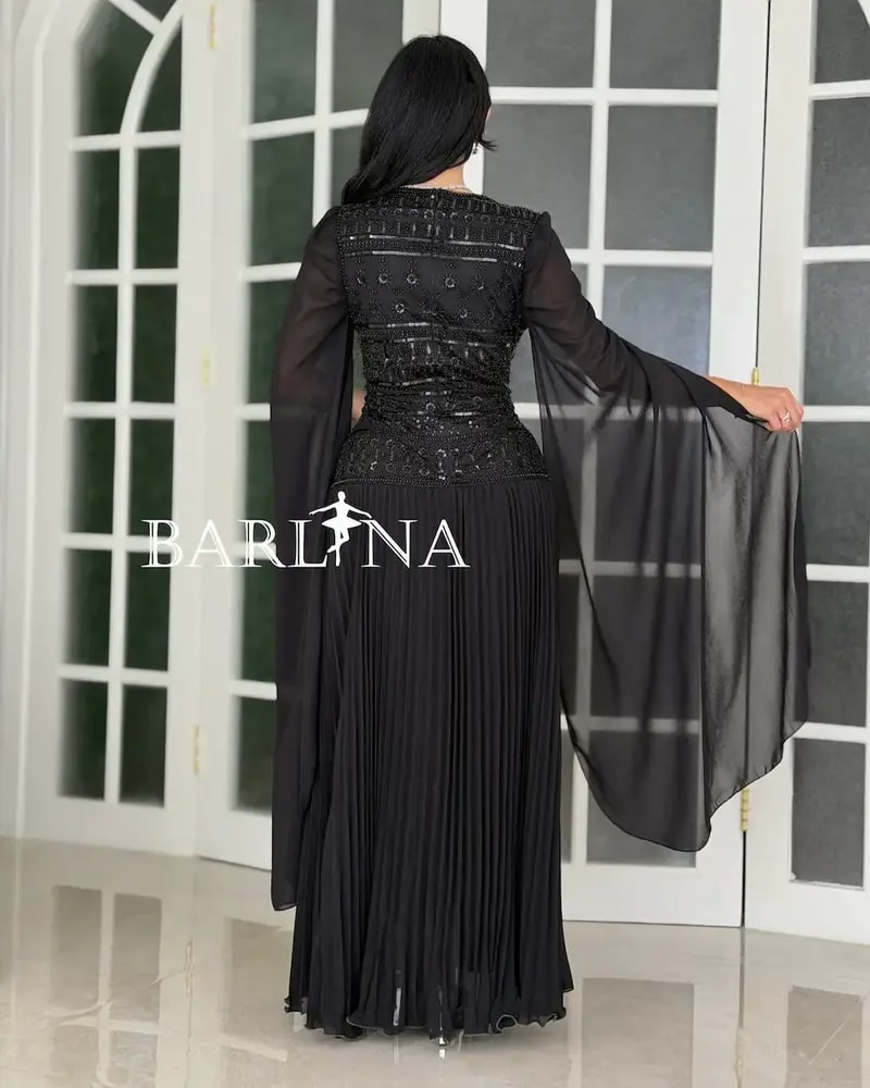 Dress with shimmering embroidery on the bodice